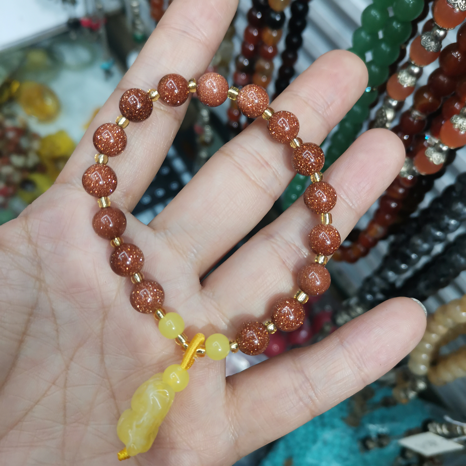 8里金沙石手串加蜜蜡皮丘穗子