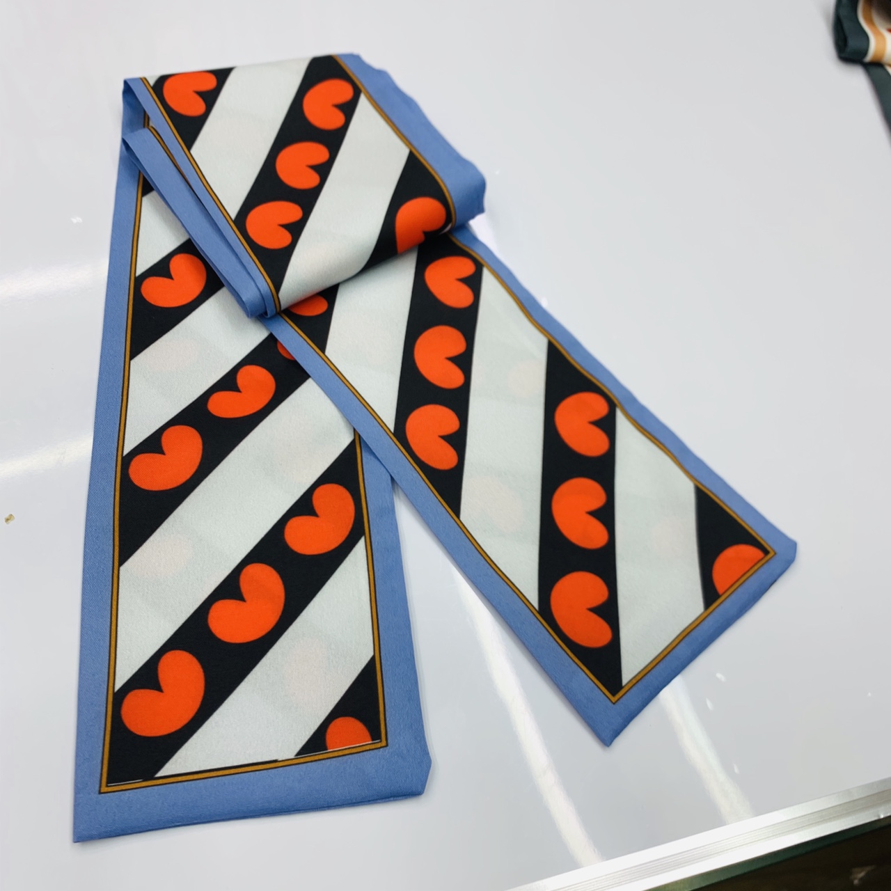 Use the wide version with a ribbon heart blue border more often