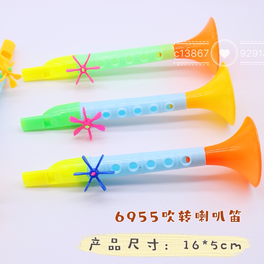 Children's plastic toys for blowing flutes and whistles as gifts
