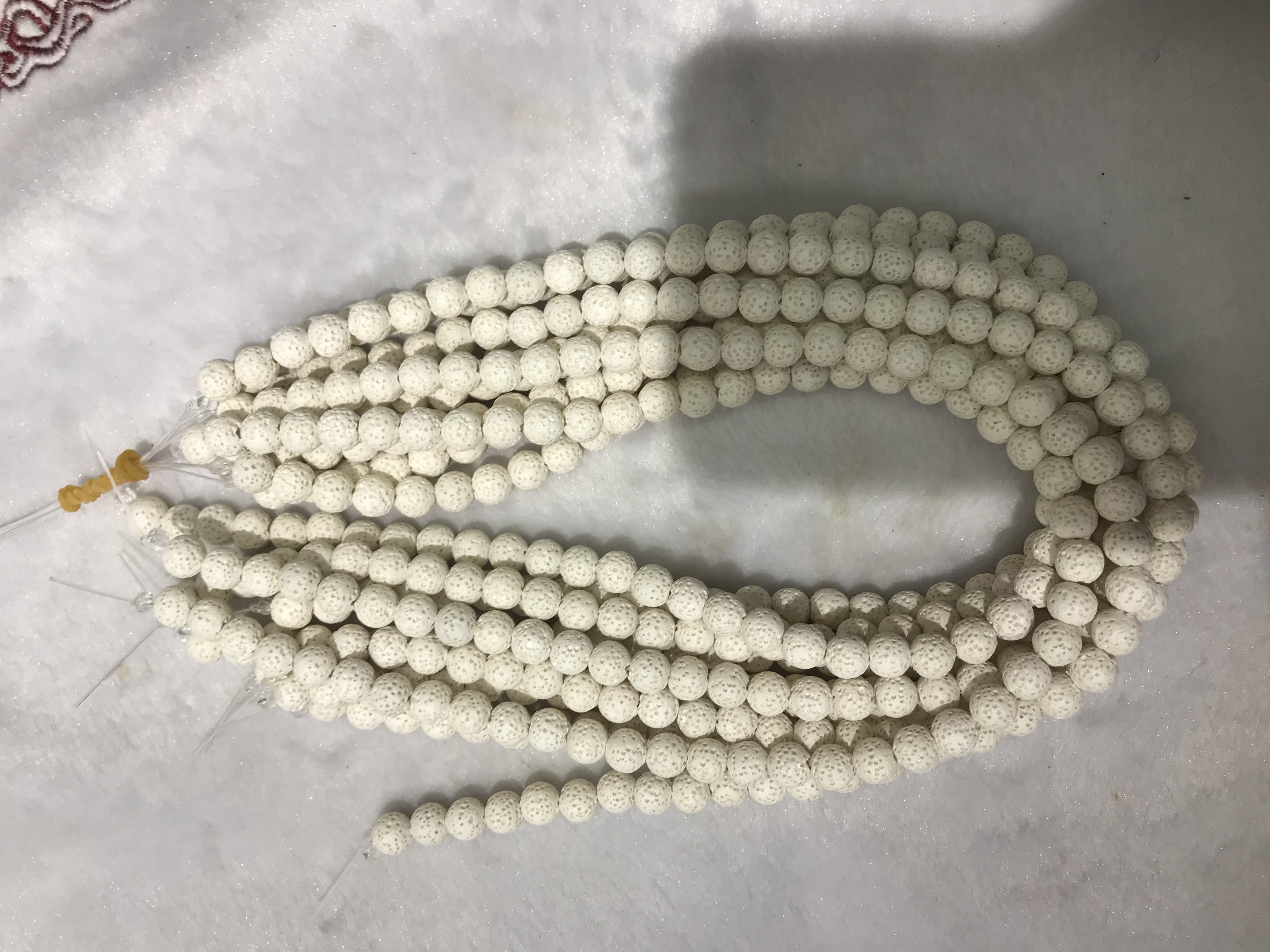 火山岩10mm车轮浅紫白底实物图