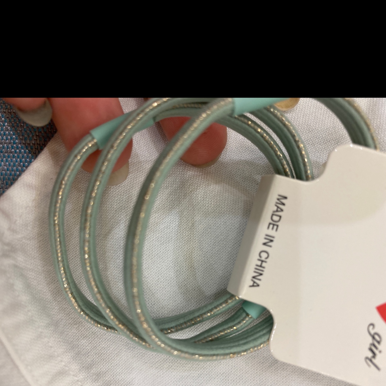 Gold band on the card 27