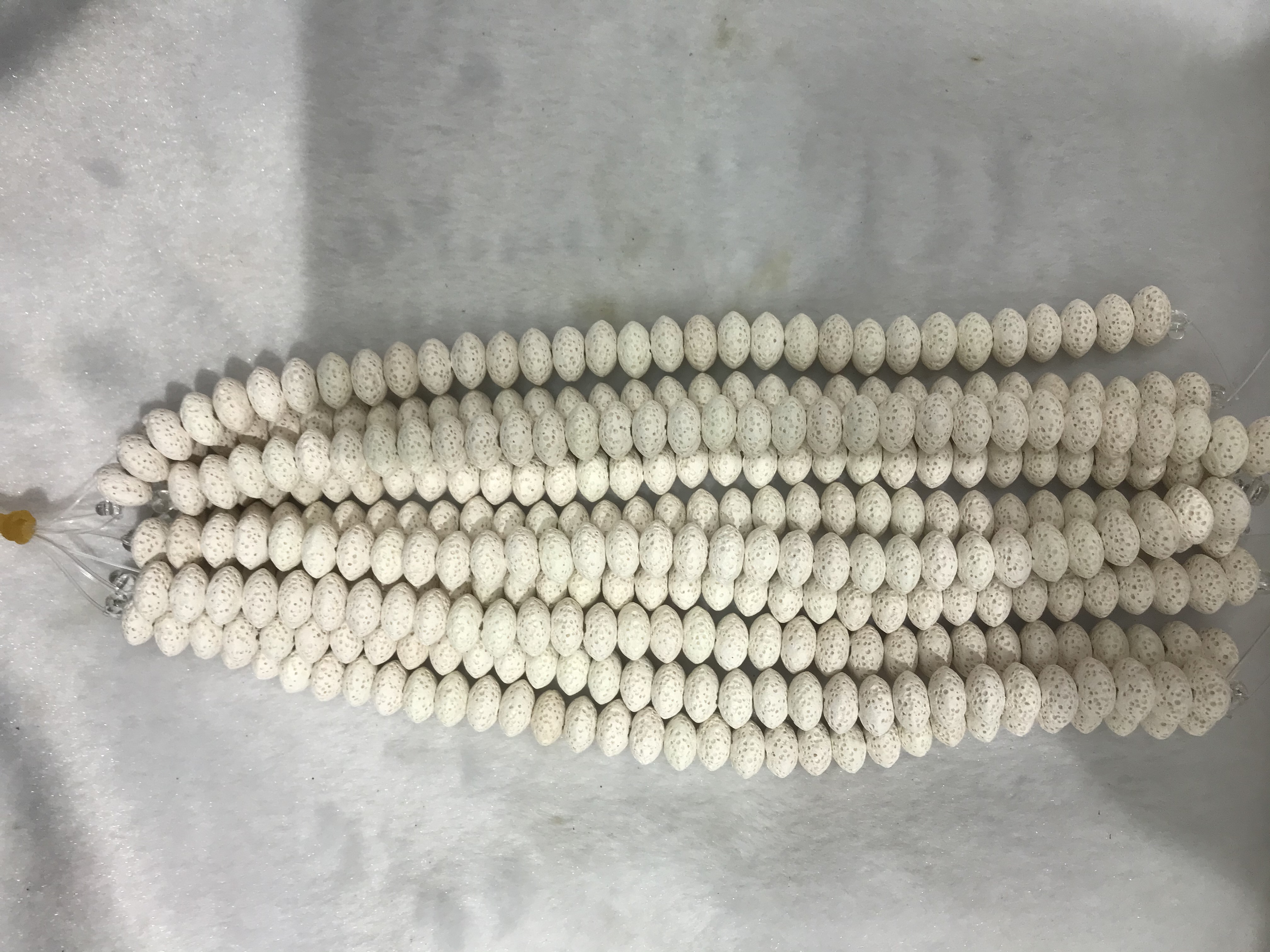 火山岩8*5mm车轮粉绿细节图