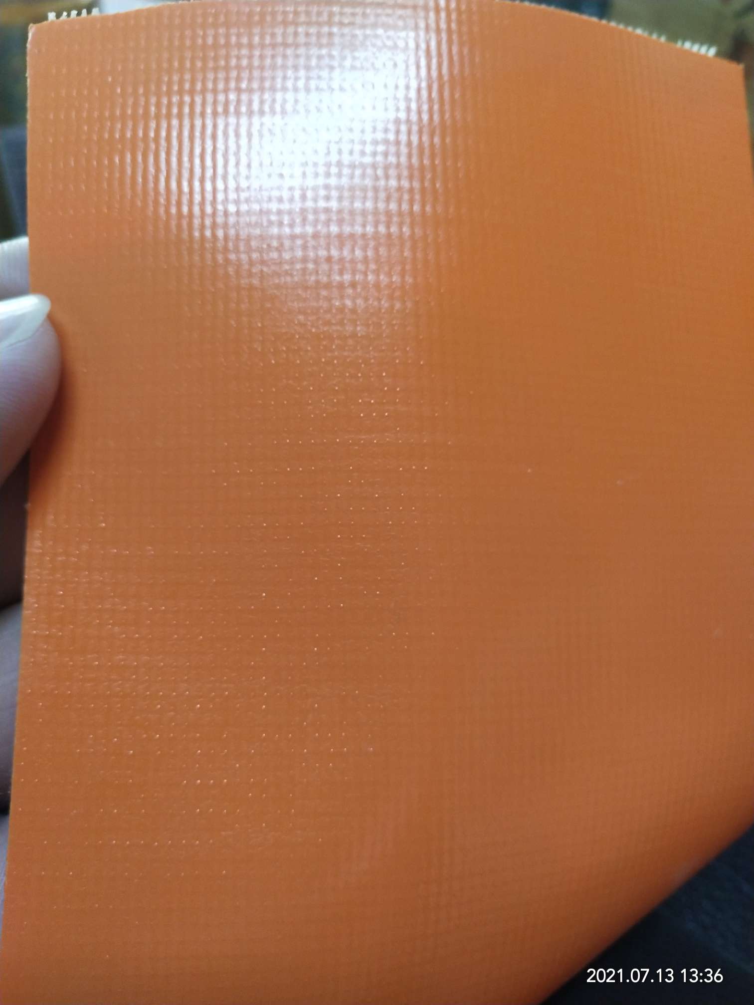 橘黄色光面PVC夹网布  箱包布  机器罩家具罩体育游乐产品专用面料详情图9