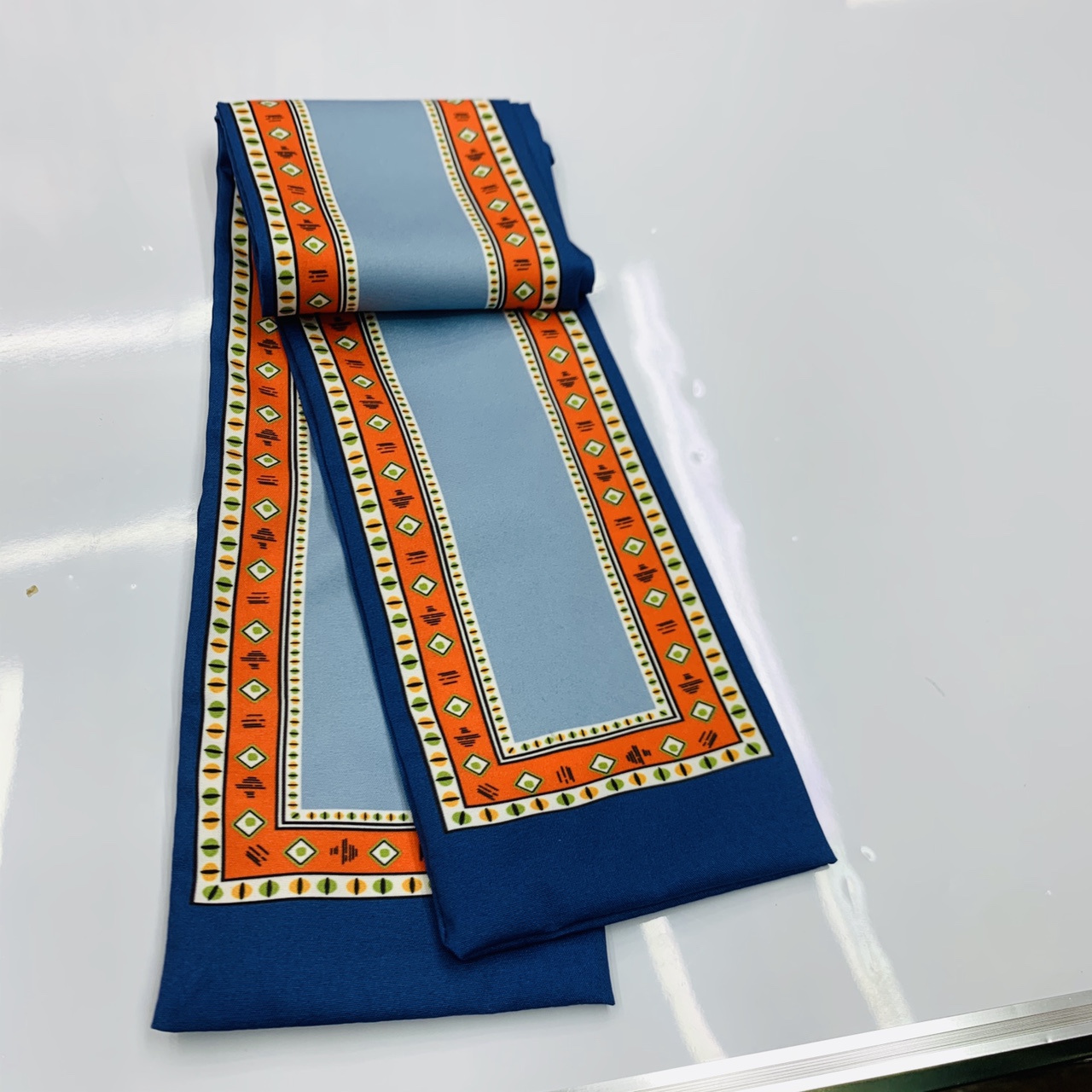 Use the wide version with blue ribbons more often