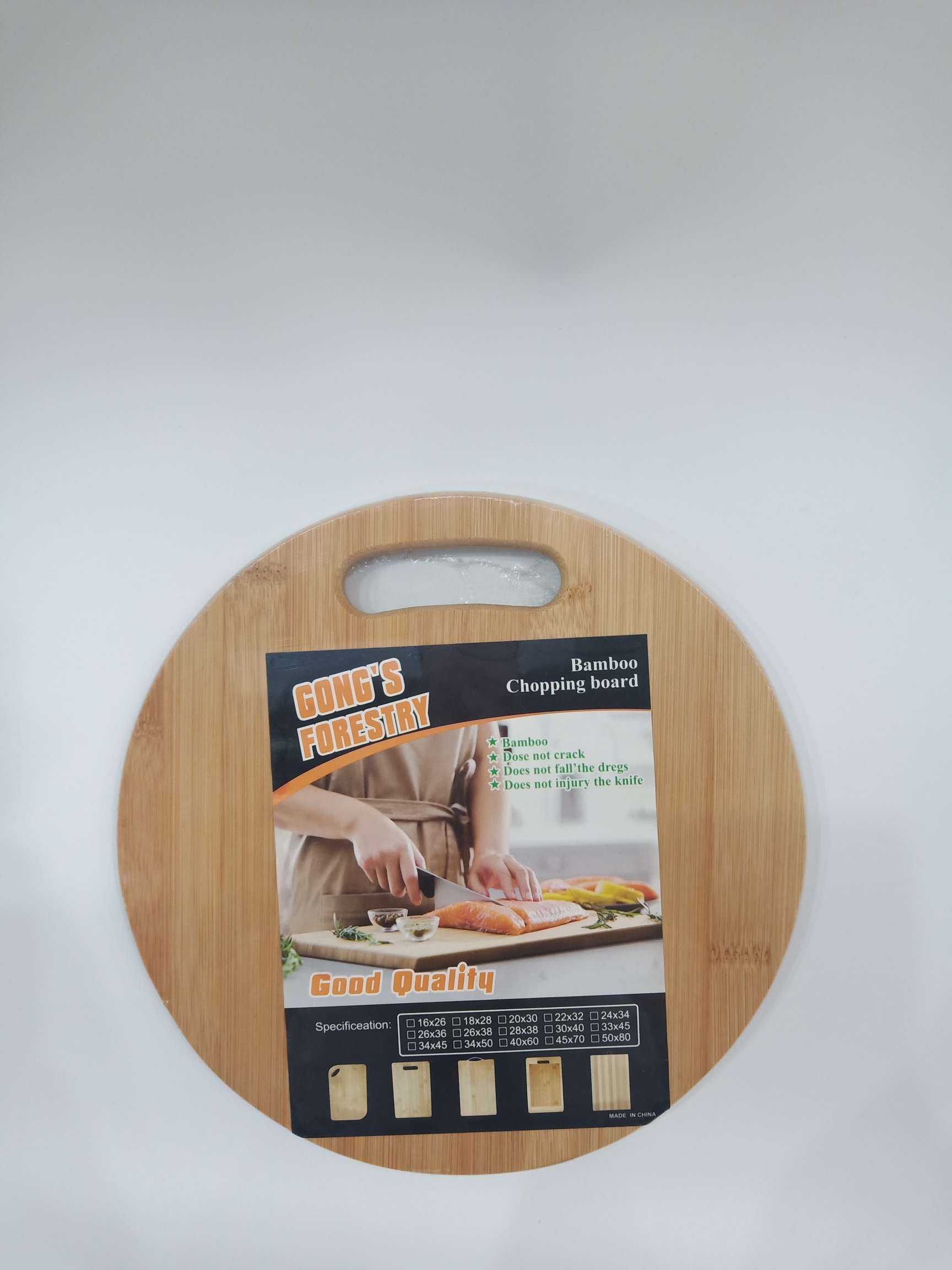 Hand-held round cutting board detail image 1