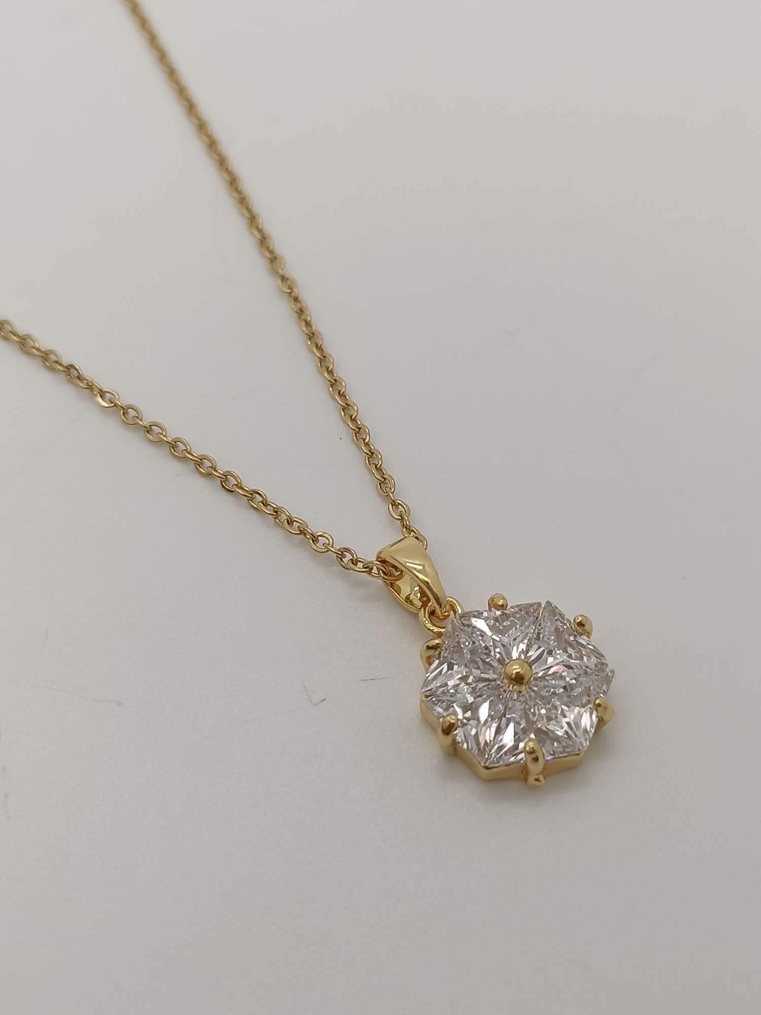 Golden snowflake necklace details Picture