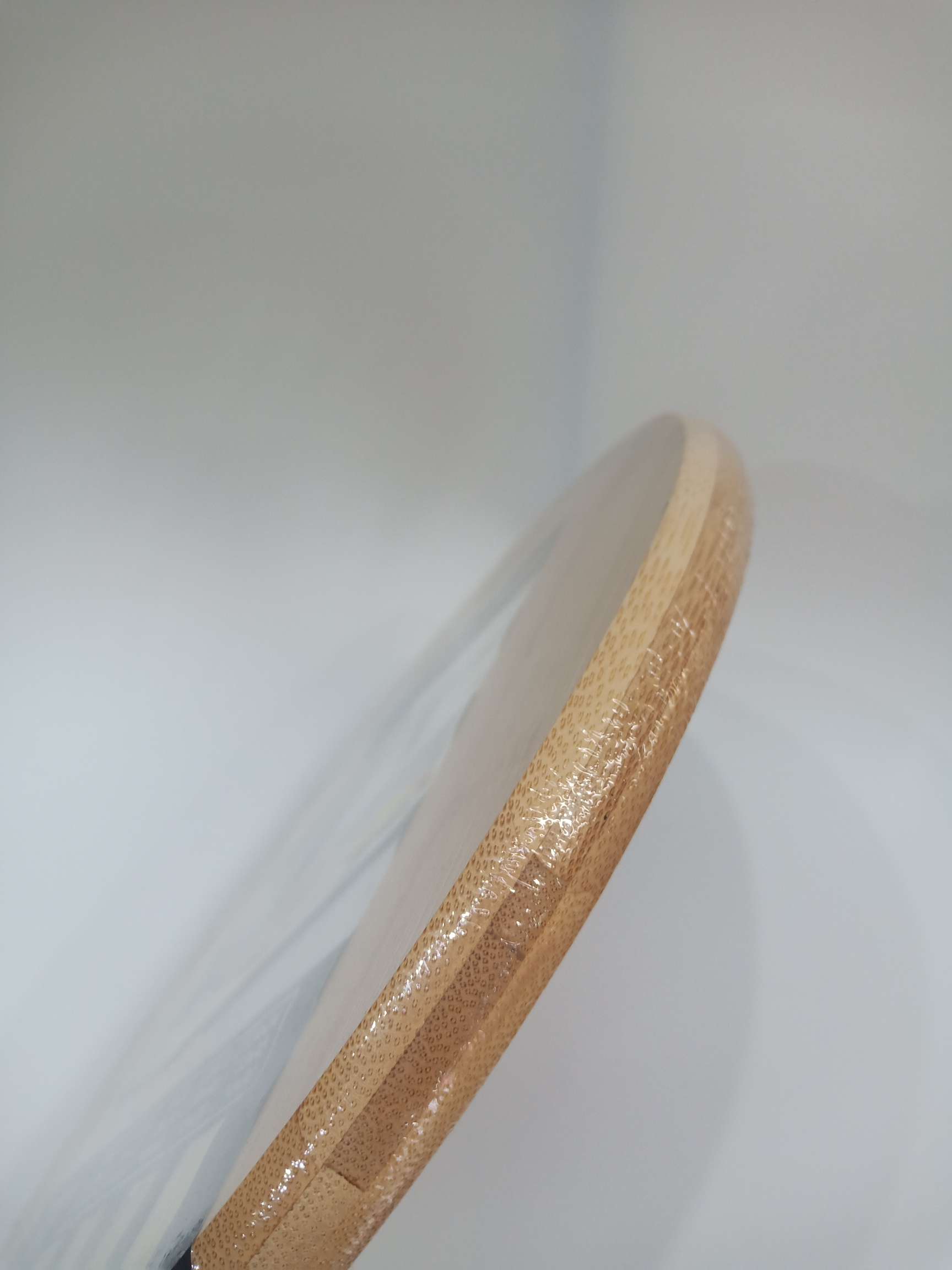 Hand-held round cutting board Item Picture