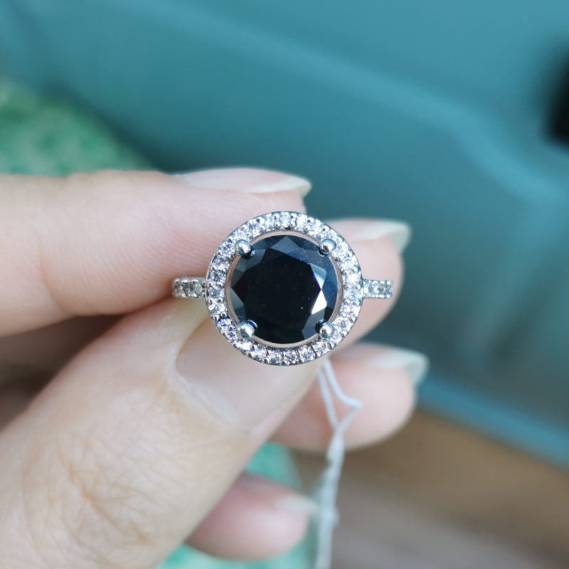 Black round stone ring