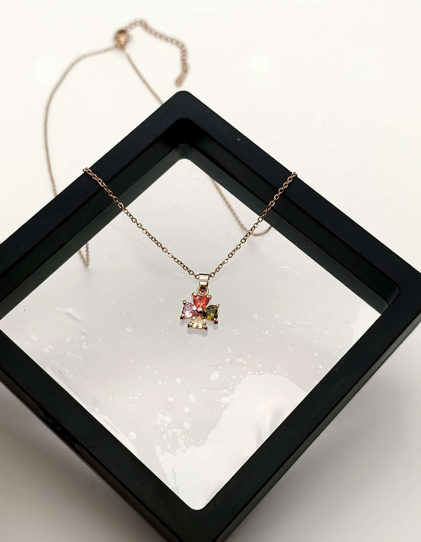 A small golden snowflake necklace details Picture