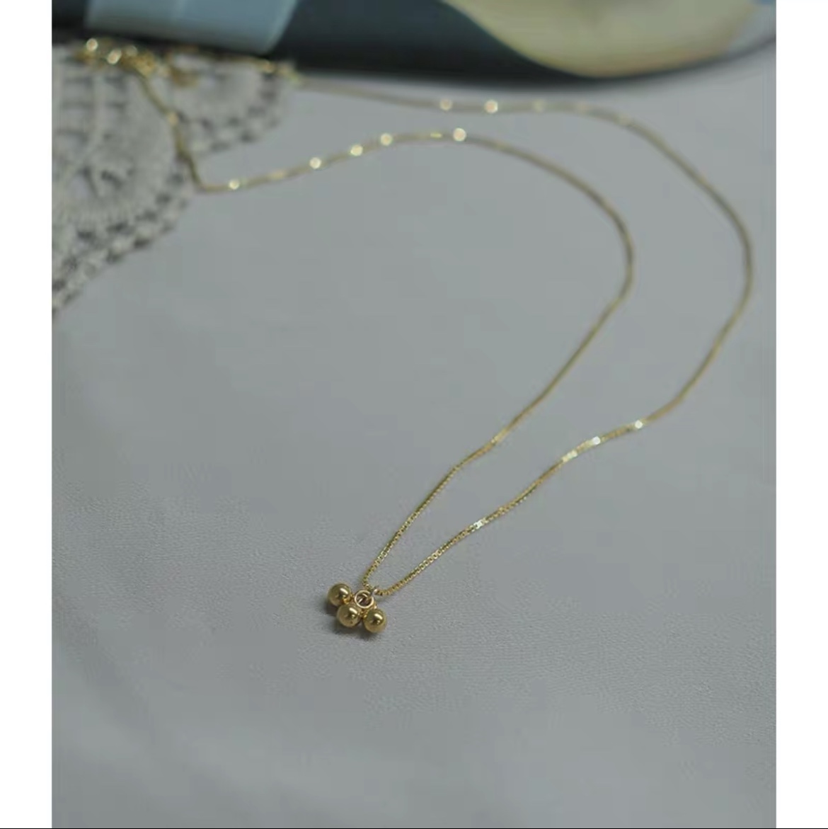 Three gold collarbone chains
