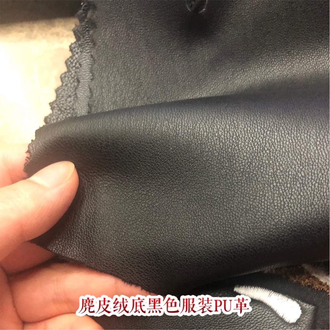 PU leather suede base, soft to the touch, black jacket leather fabric