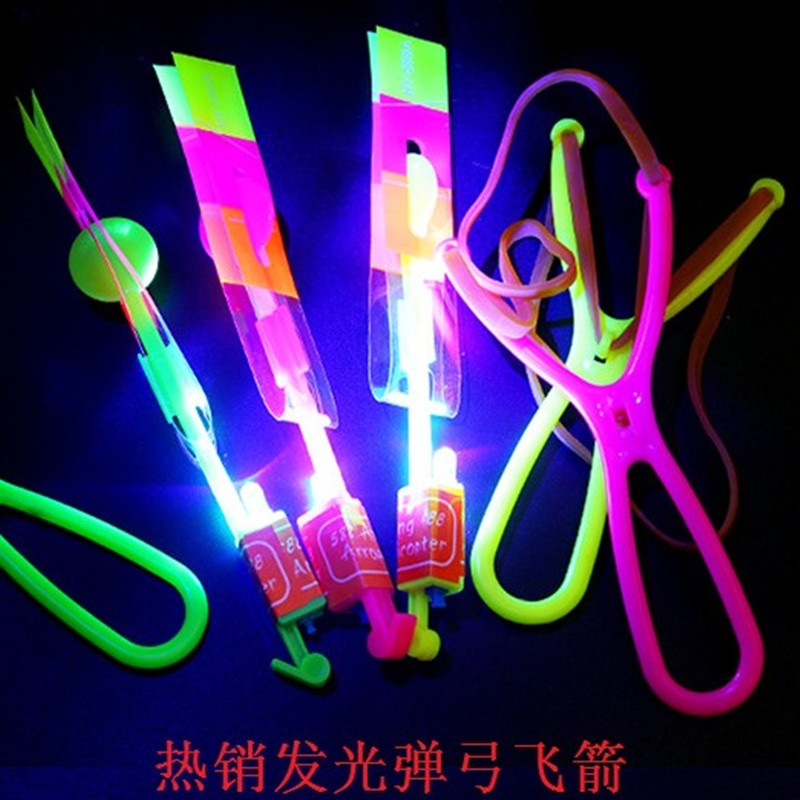 Glowing small slingshot arrows, double-flashing lights, flying swords, night market street stalls, popular toys, small toy manufacturer direct sales, double-flashing small slingshot arrows, flying swords, shooting flying swords Application Scenario