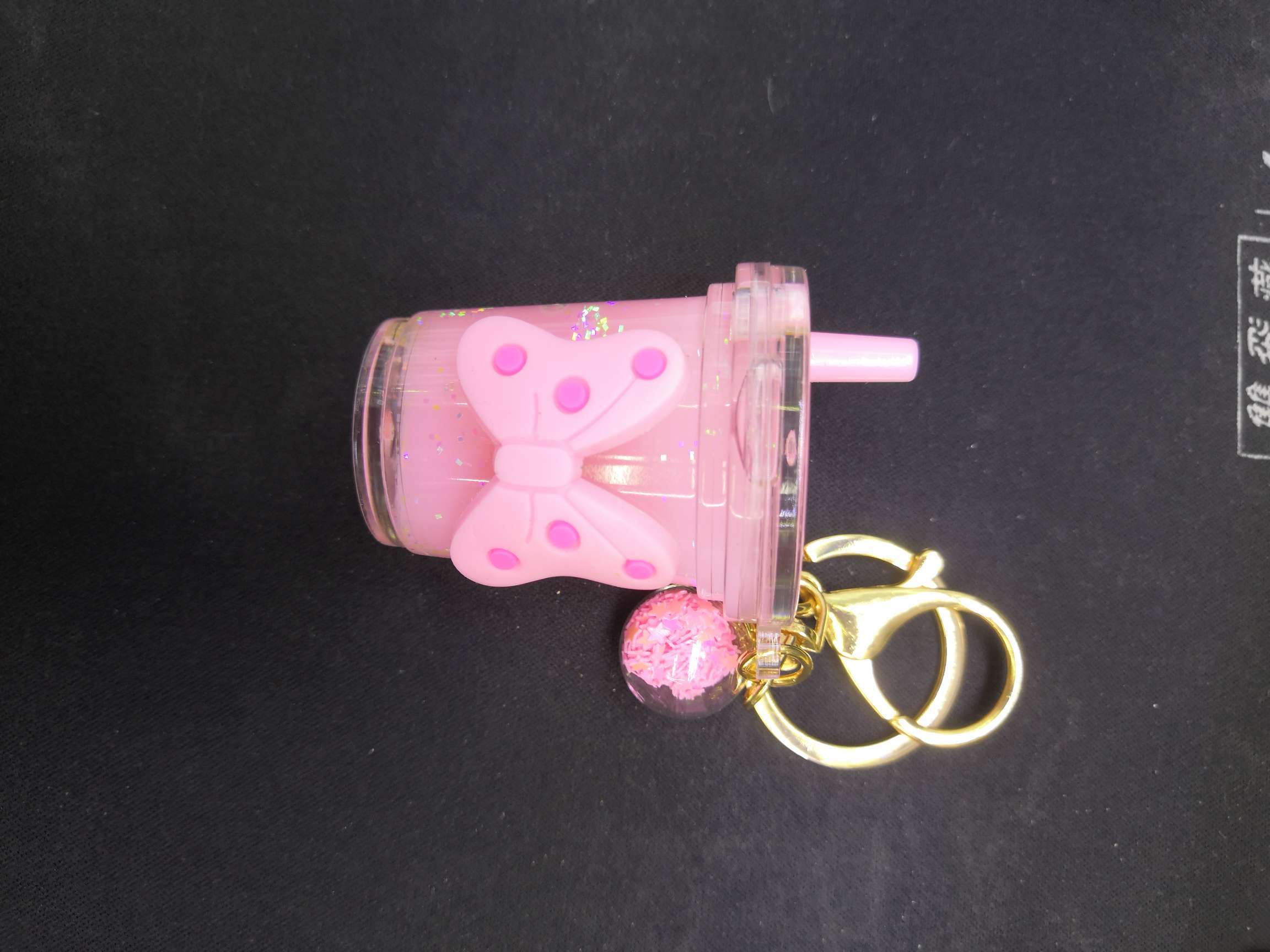 Oil bottle keychain 4 details Picture