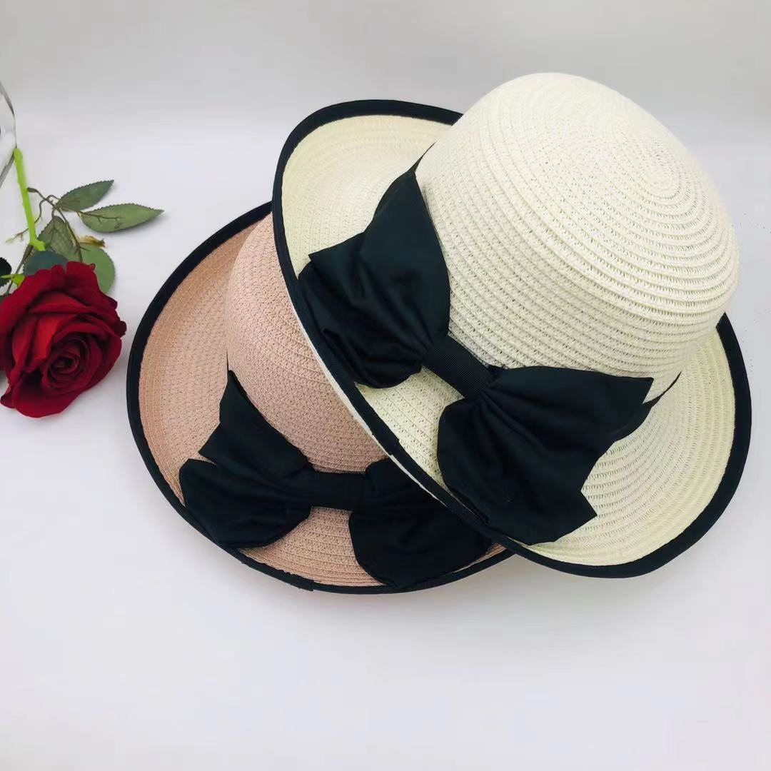 Star-style straw hats, children's fashionable sun protection hats, bow rolled-up sun hats, seaside vacation photo hats, summer hats details Picture