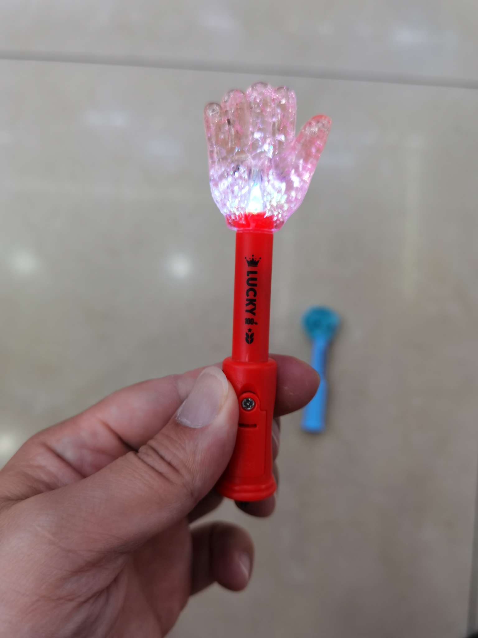 Glowing little hand stick details Picture