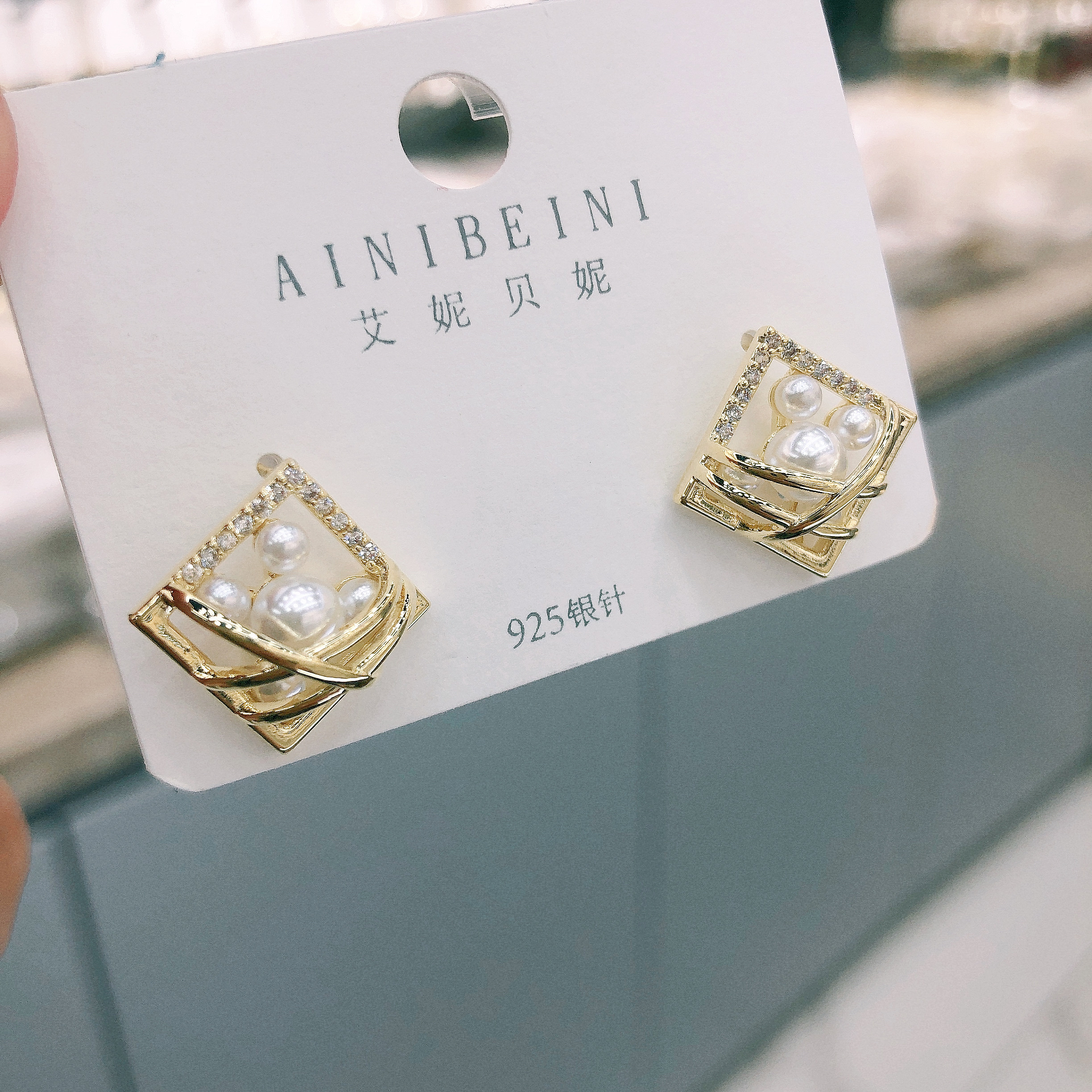 Korean diamond-shaped pearl hollowed-out earrings 2021 new style stud earrings simple, small and individual diamond-shaped trendy earrings for women details Picture