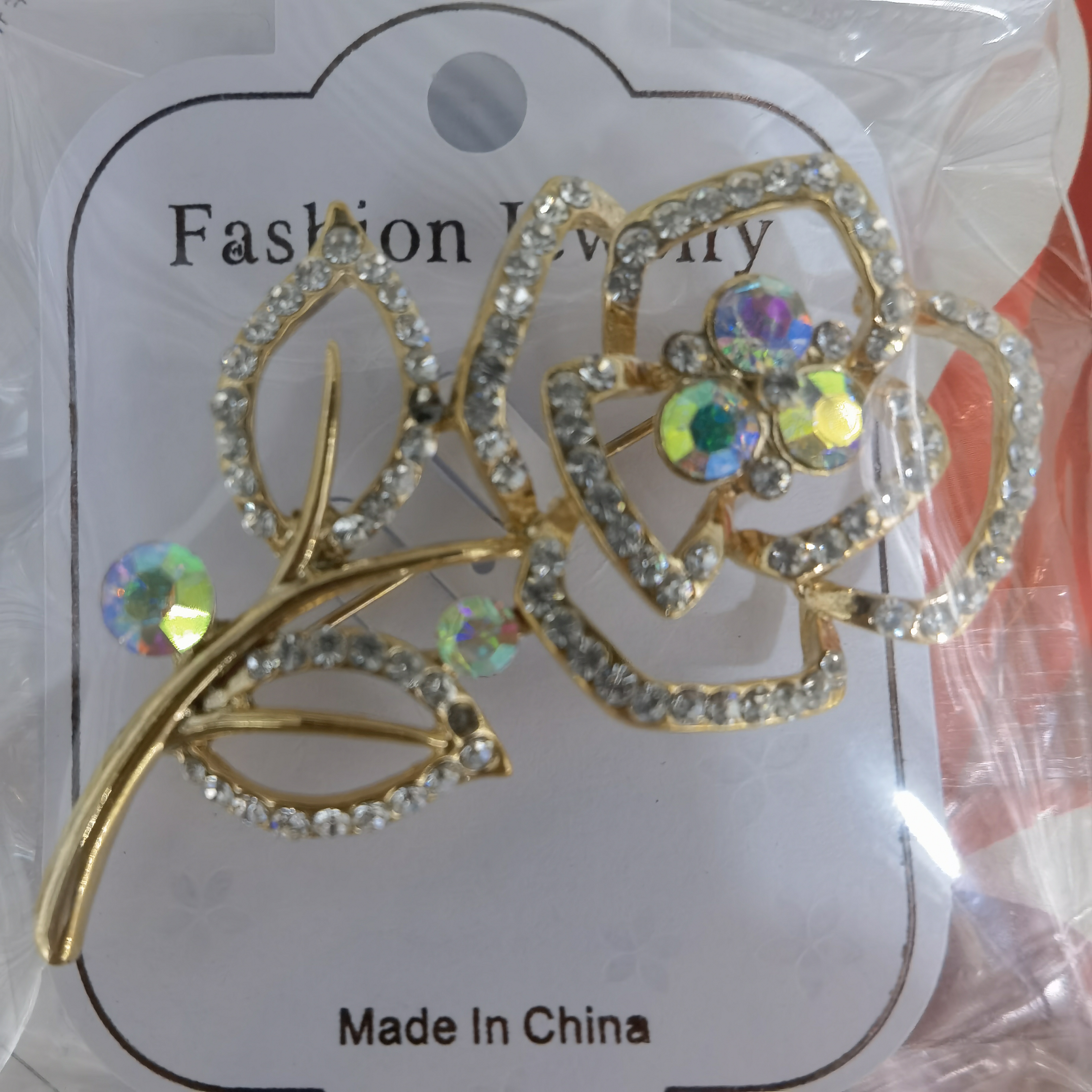 Rhinestone rose temperament brooch