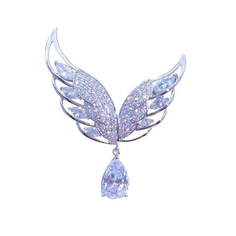 Wing brooch