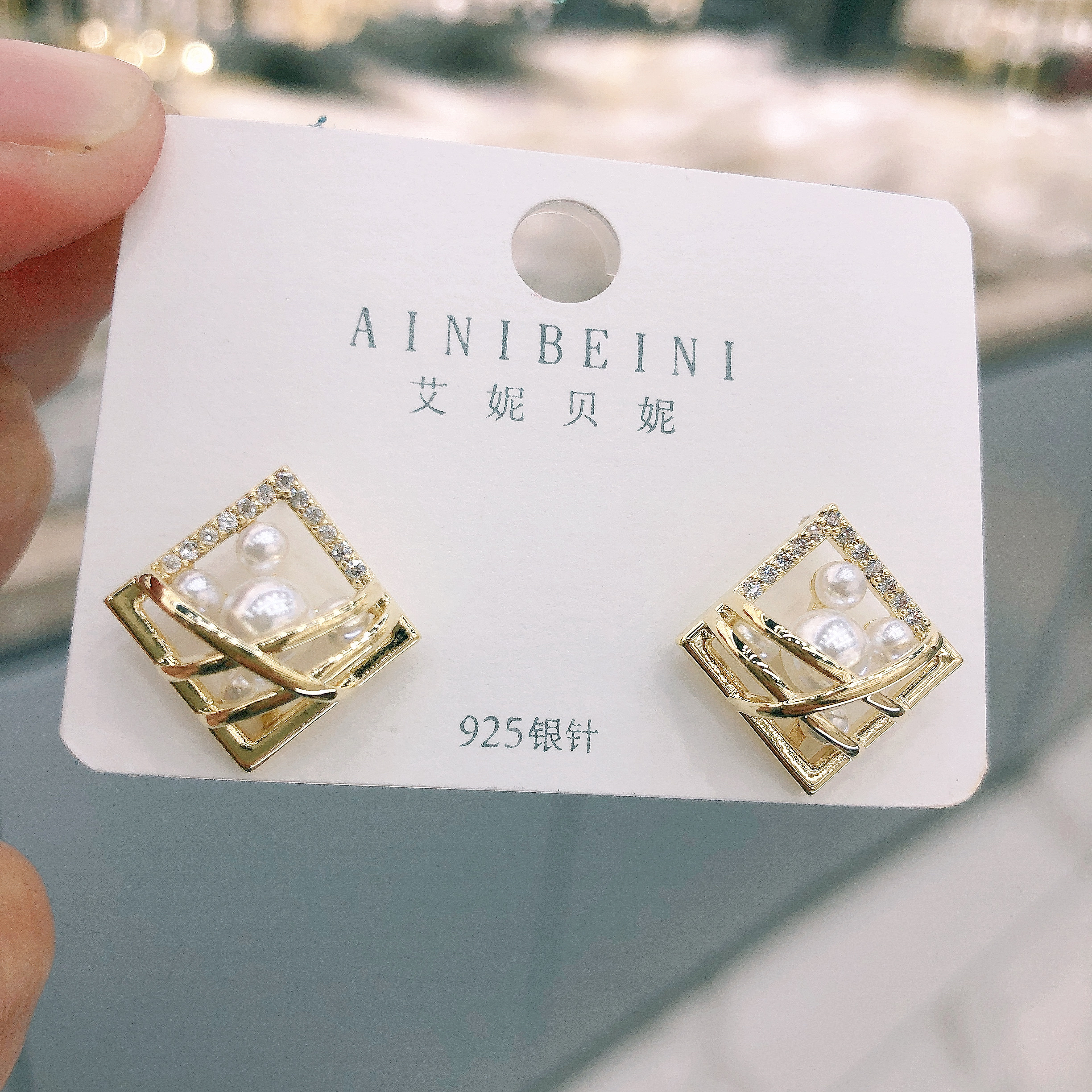 Korean diamond-shaped pearl hollowed-out earrings 2021 new style stud earrings simple, small and individual diamond-shaped trendy earrings for women Specification image