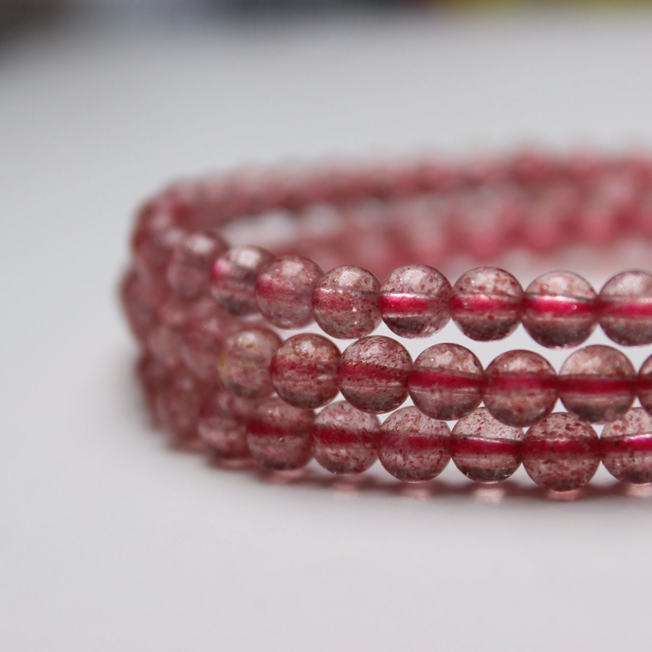 １５年老店白玉晶珠宝草莓晶4mm三圈