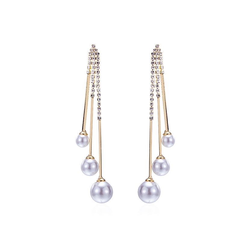 Cat's eye stone earrings, a trendy and stylish 2021 Korean fashion icon, are versatile long tassel earrings that can help slim the face detail image 3