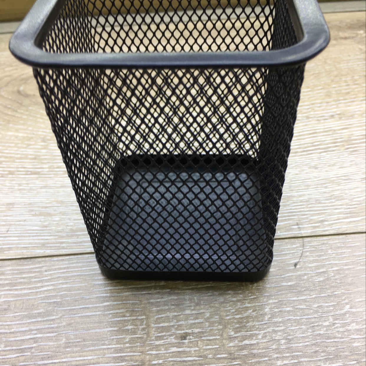 The square pen holder is black