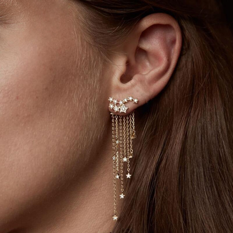 A pair of diamond-encrusted star tassel chain back-hanging earrings from Europe and America