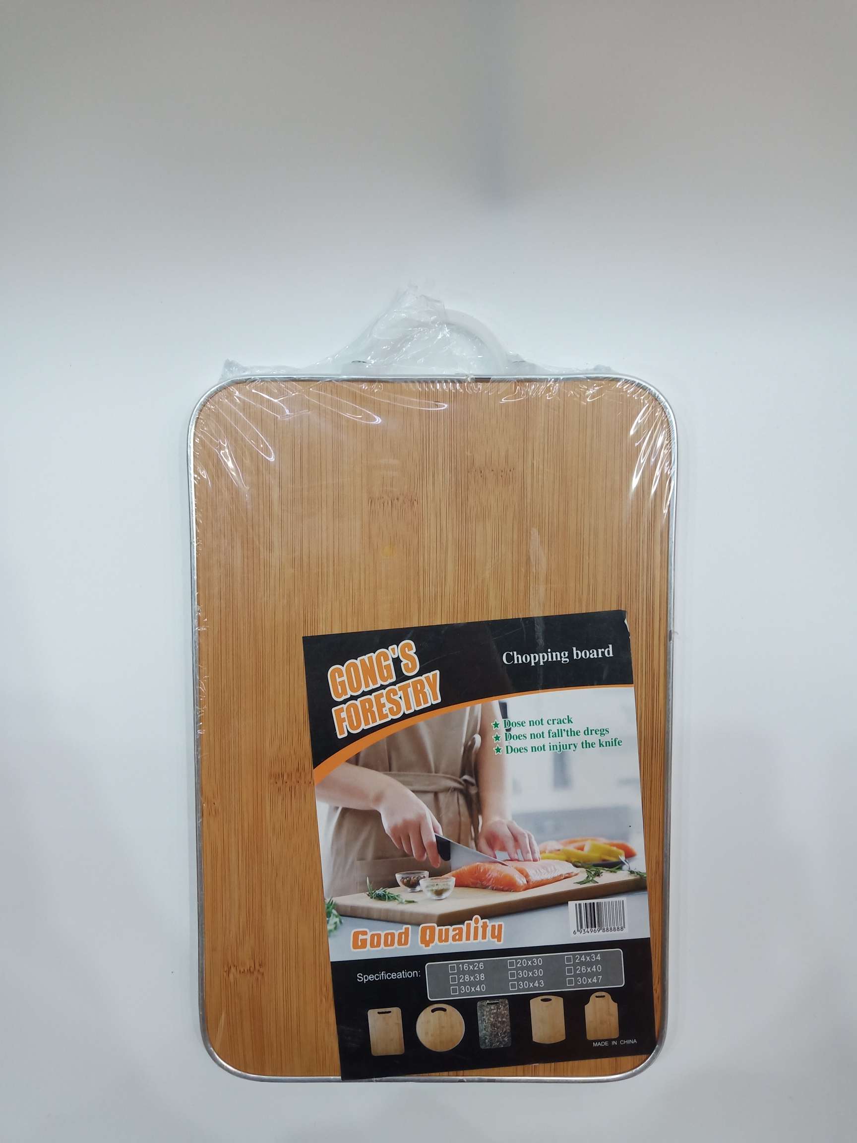 Rectangular bound cutting board with plastic handle details Picture