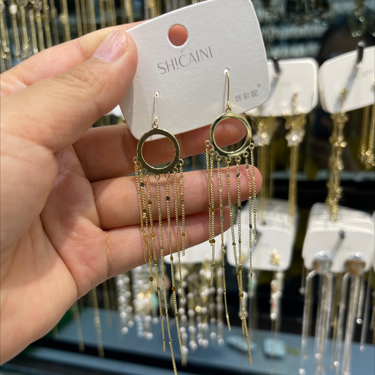 Round tassel ear hook