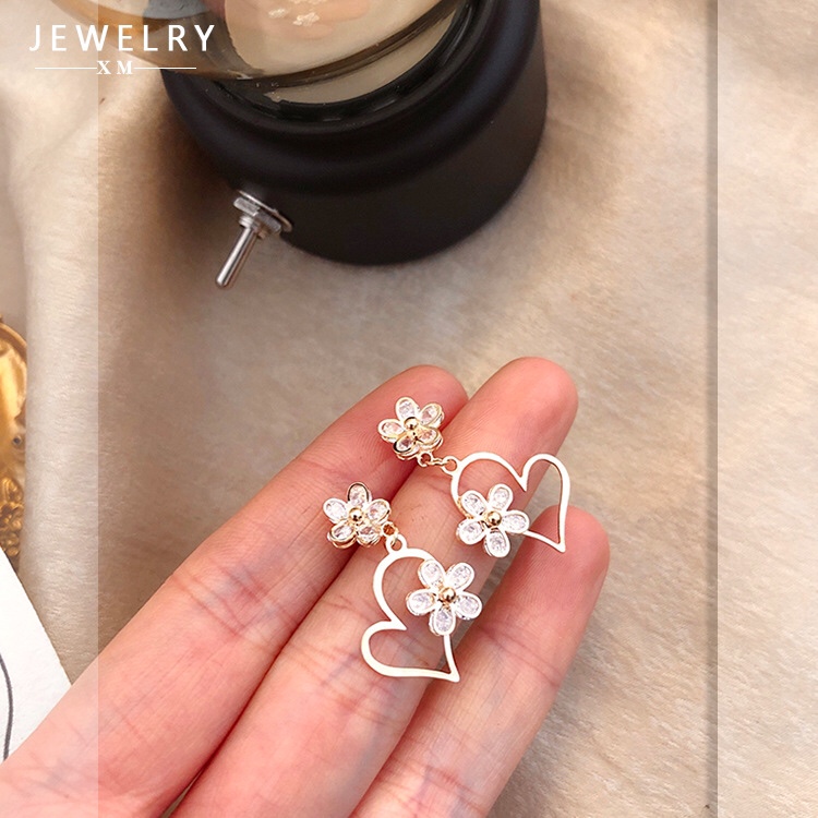 Double plum blossom stud earrings