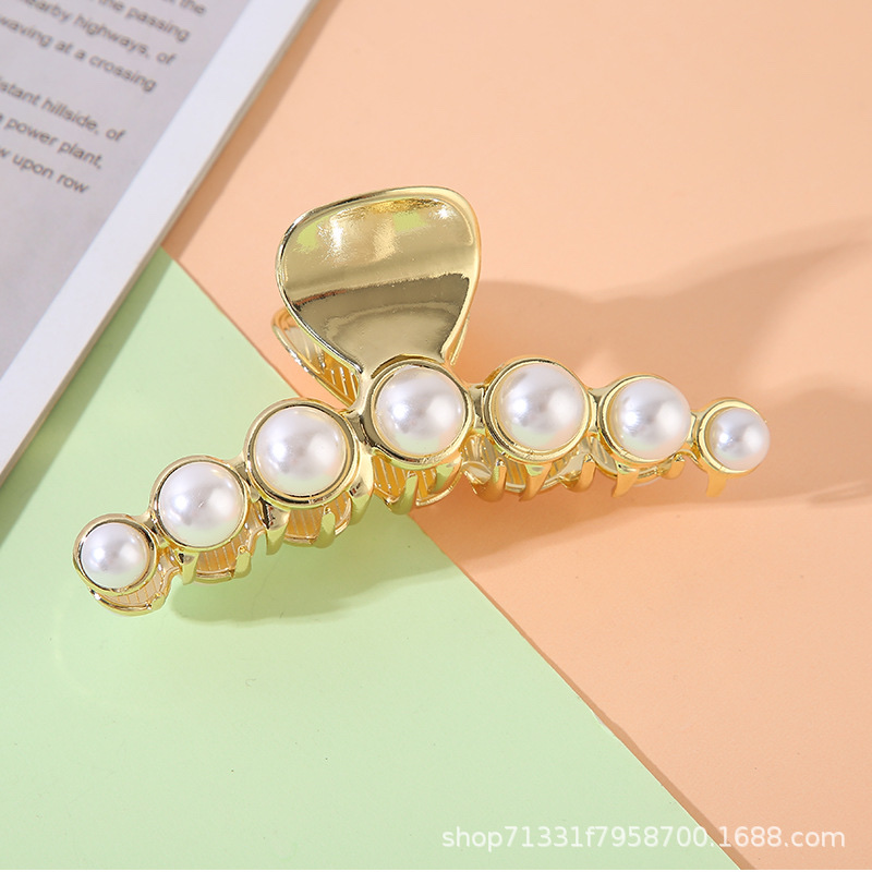 2021 New pearl hair clips, cat's eye hair clips, back head fixed gripper hair accessories Item Picture