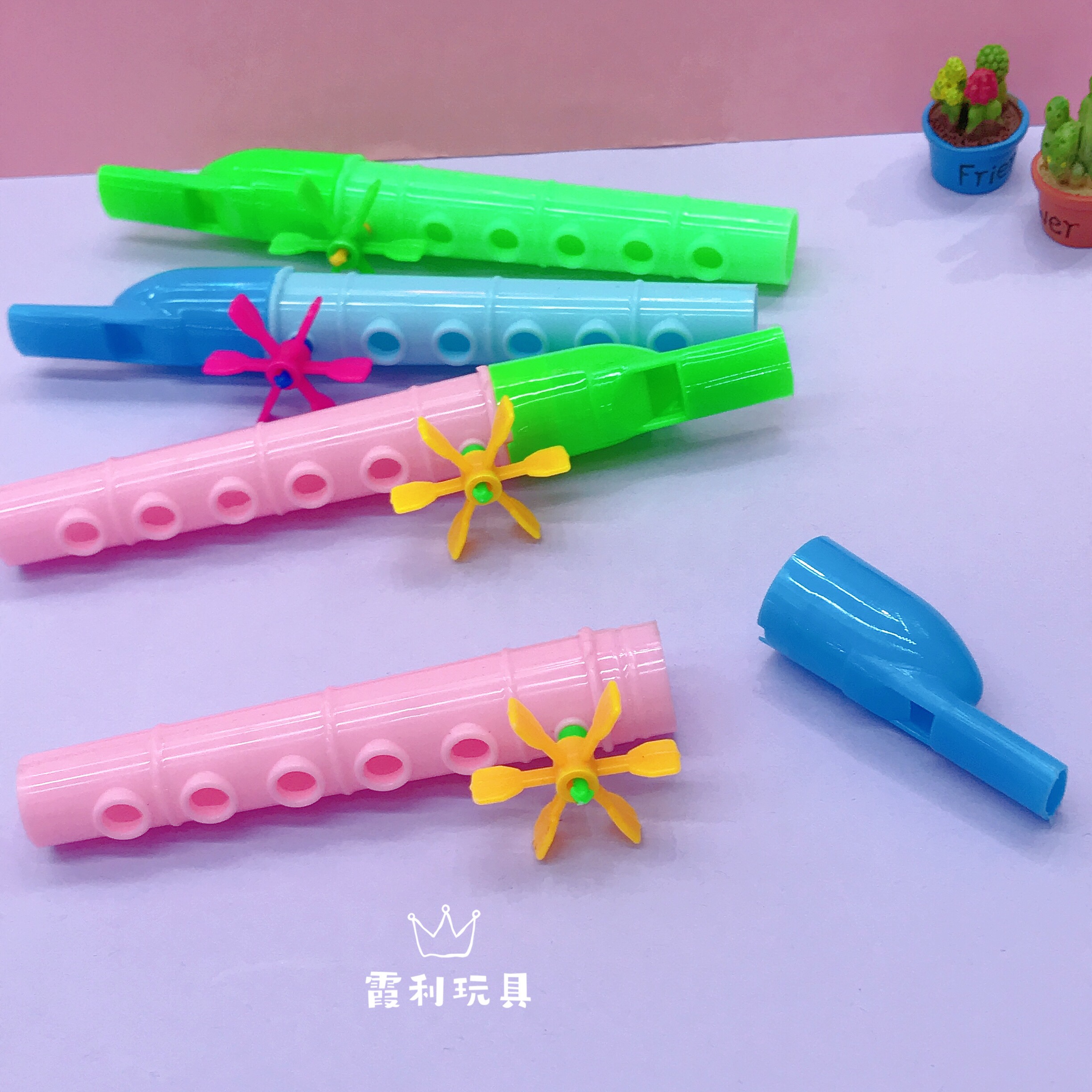 A plastic toy for children waiting for the bus to blow the whistle as a gift Application Scenario