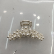 Five small flower claw clips