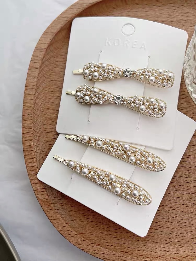 Simple and elegant style hair clips, one-line bangs, seaside clips, popular female celebrity pearl water diamond hair clips, Korean Item Picture