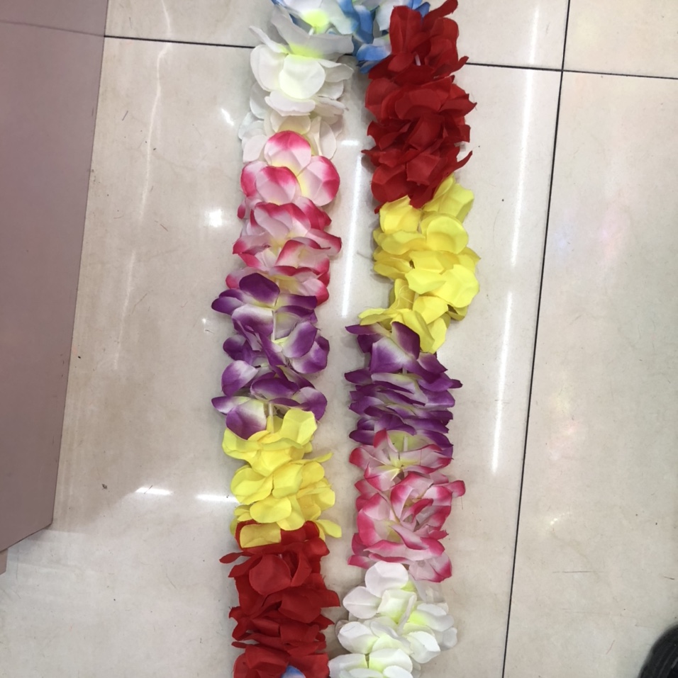 A rose-petal-colored garland