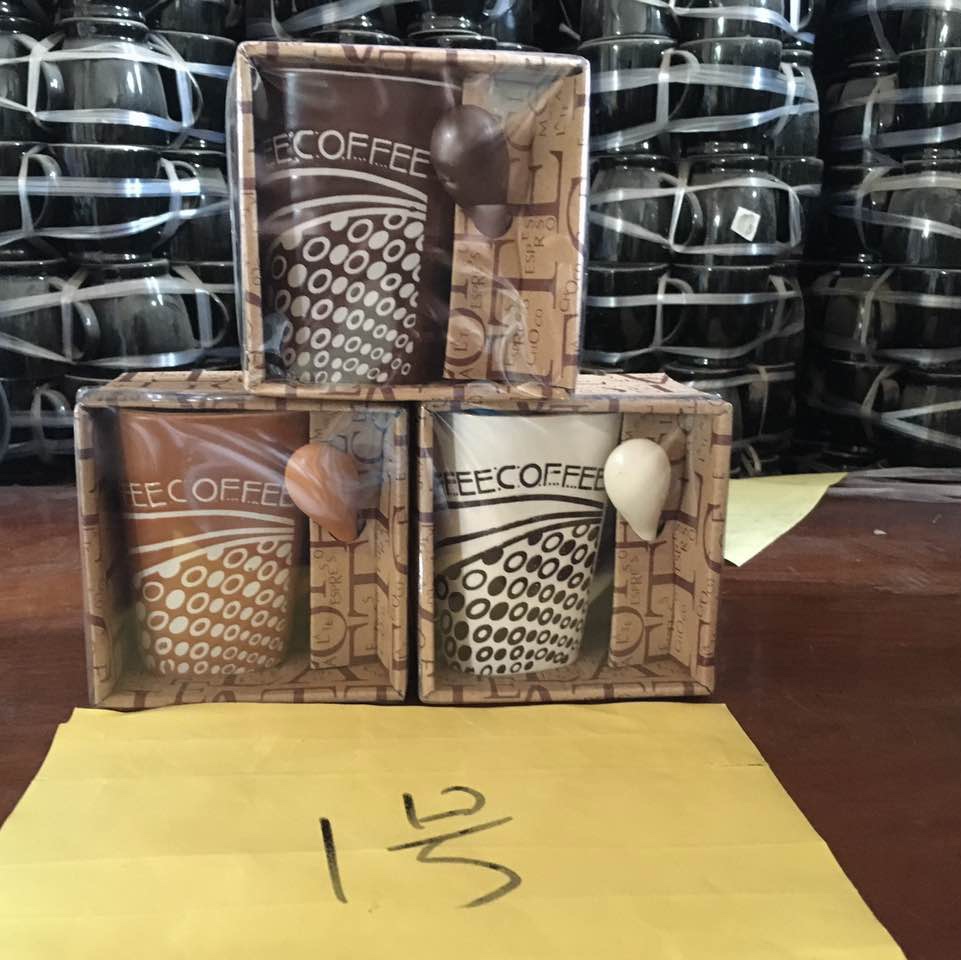 Hand-painted coffee cups in color boxes