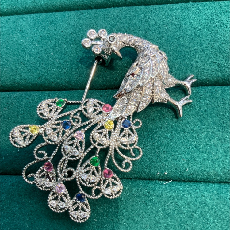 Peacock brooch