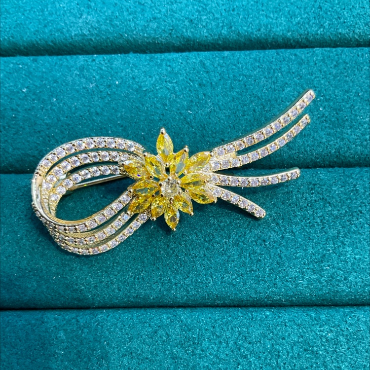 High-end, atmospheric, classy bow brooch