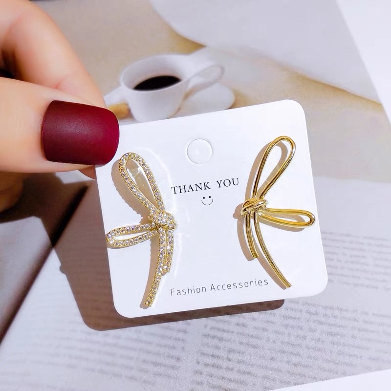 High-end bow stud earrings for women, 2021 new style, trendy and simple Korean style, asymmetrical earrings that are popular on the Internet Specification image