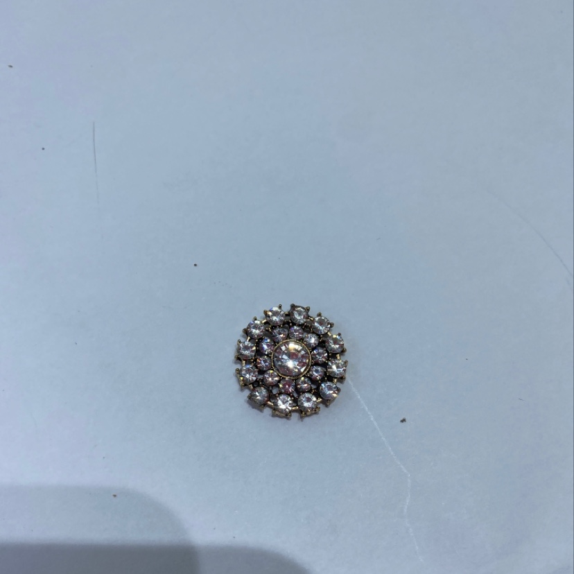 A large white diamond circle