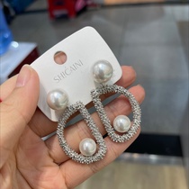 Metallic wind pearl earrings