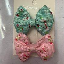 12-point iris ribbed with back to back bow clip pink, blue green