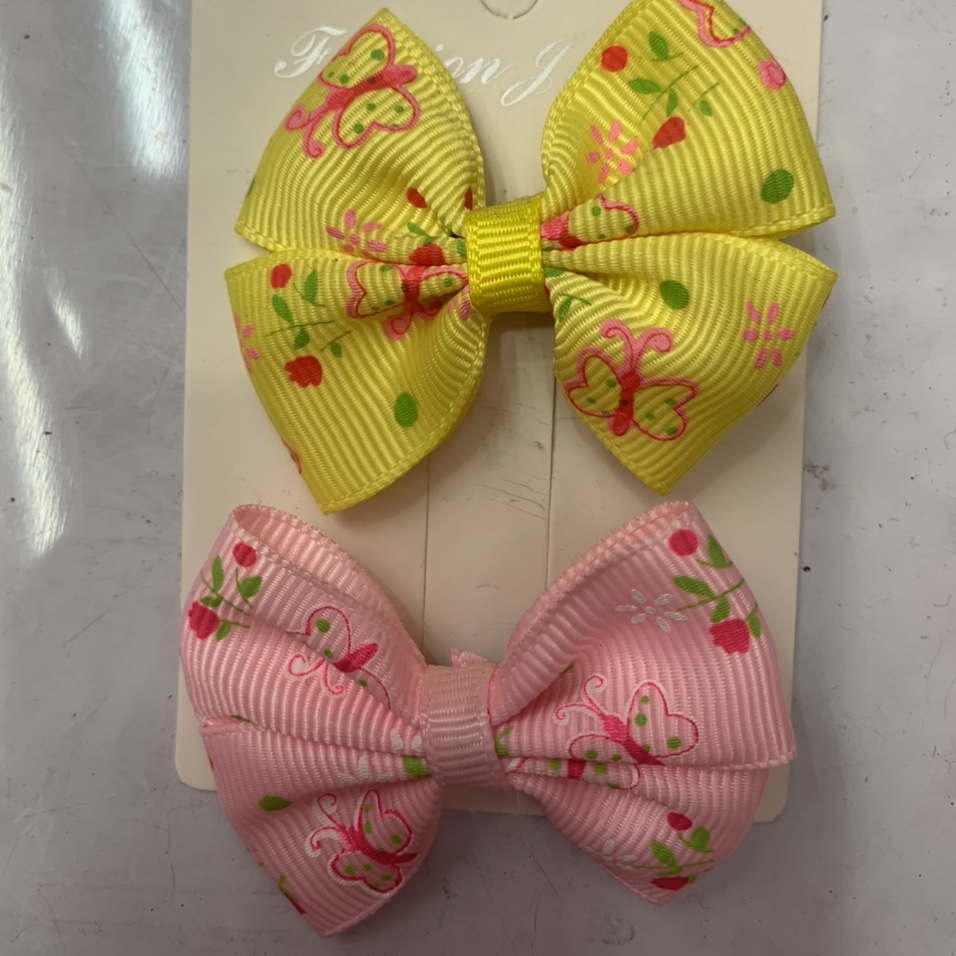 12 points iris ribbed with back to back bow clip pink, yellow
