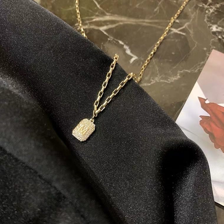 This 14K gold-plated, dazzling, diamond-filled square brand collarbone chain M letter necklace features a simple and niche design for Instagram street style detail image 5