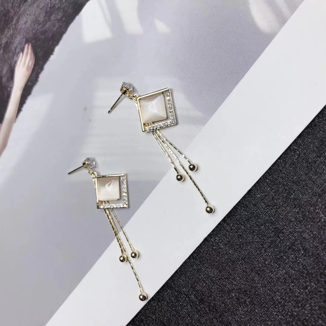 s925 plata de ley aguja pendientes 2021 nuevo estilo de moda japonés y coreano simple versátil de alto nivel sentido perla orejeras para mujeres ojo de gato