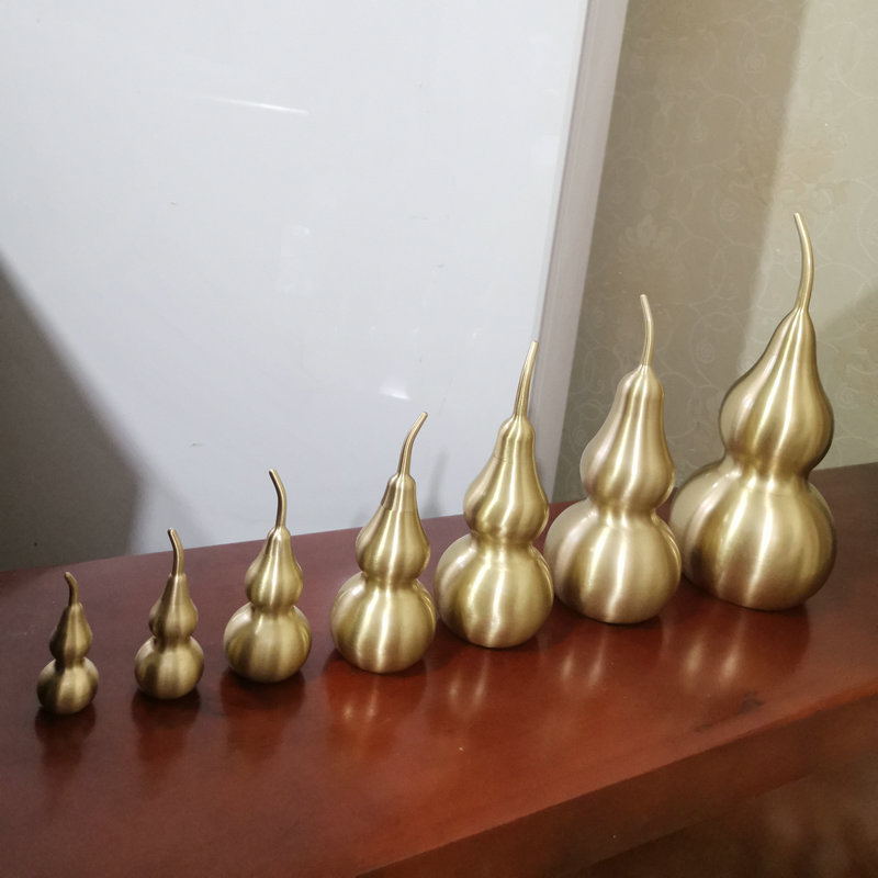 The manufacturer supplies various sizes of copper gourd ornaments, gourd hangers, car hangers, and creative hollow copper gourd hangers details Picture