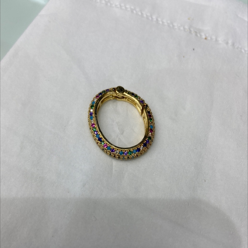 椭圆形彩色锆石镶嵌铜扣产品图
