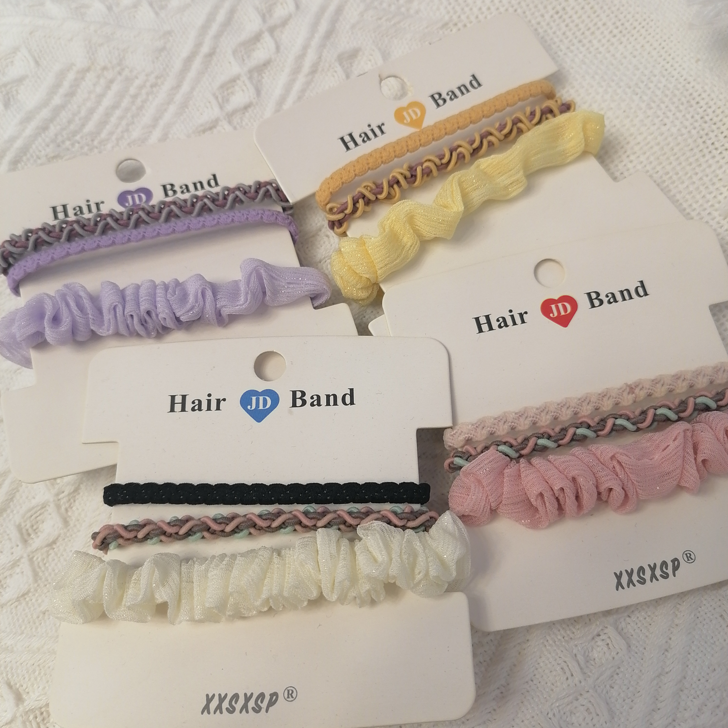 A simple and fresh Korean-style hair band as the base, a dual-purpose hair band and bracelet, a small leather case for tying the head, a high-elasticity adult hair band