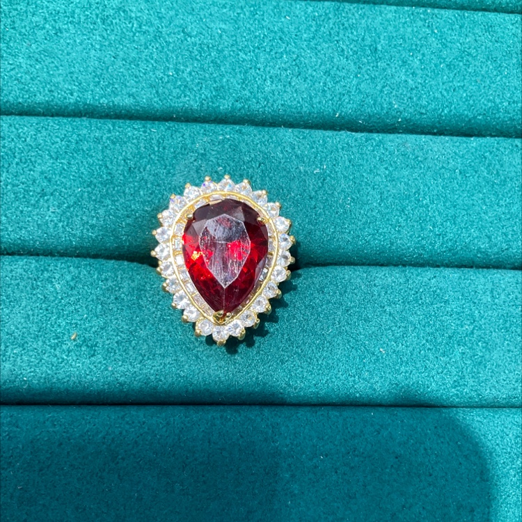 Red horse eye ring with micro-diamond setting
