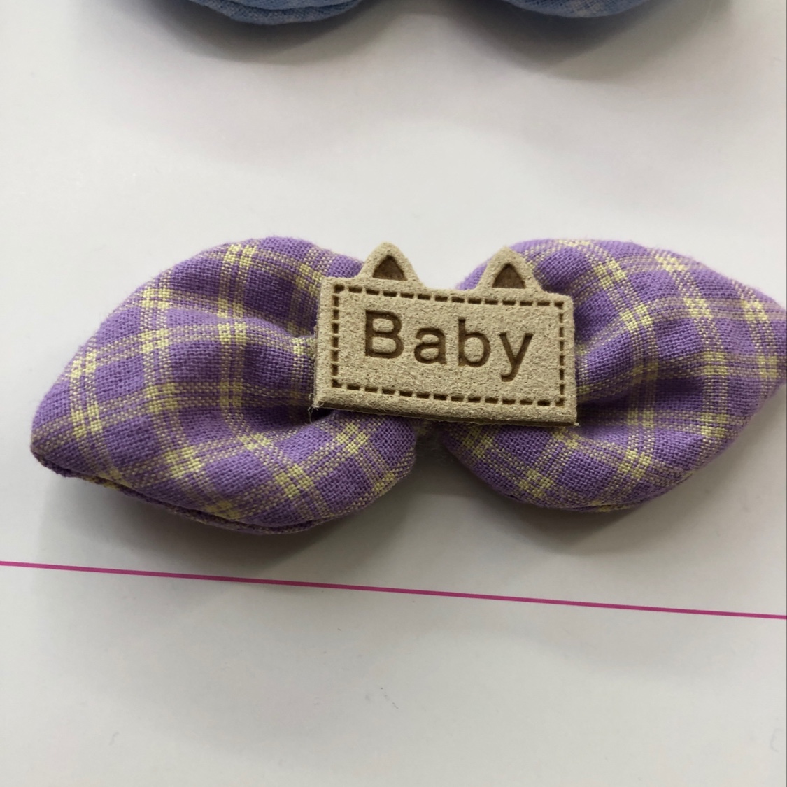 Hand-made checkered knot detail image 1